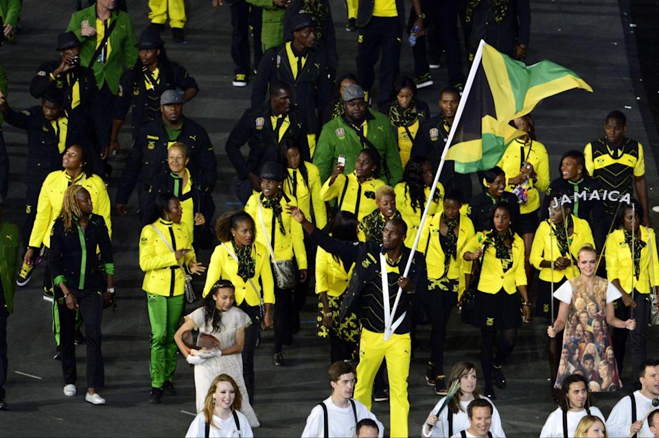     The Jamaican delegation led by Usain Bolt at the 2012 Olympics opening ceremony (JOHN MACDOUGALL/AFP/Getty Images)
