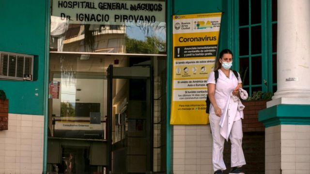 A nurse leaves the health center in Buenos Aires.