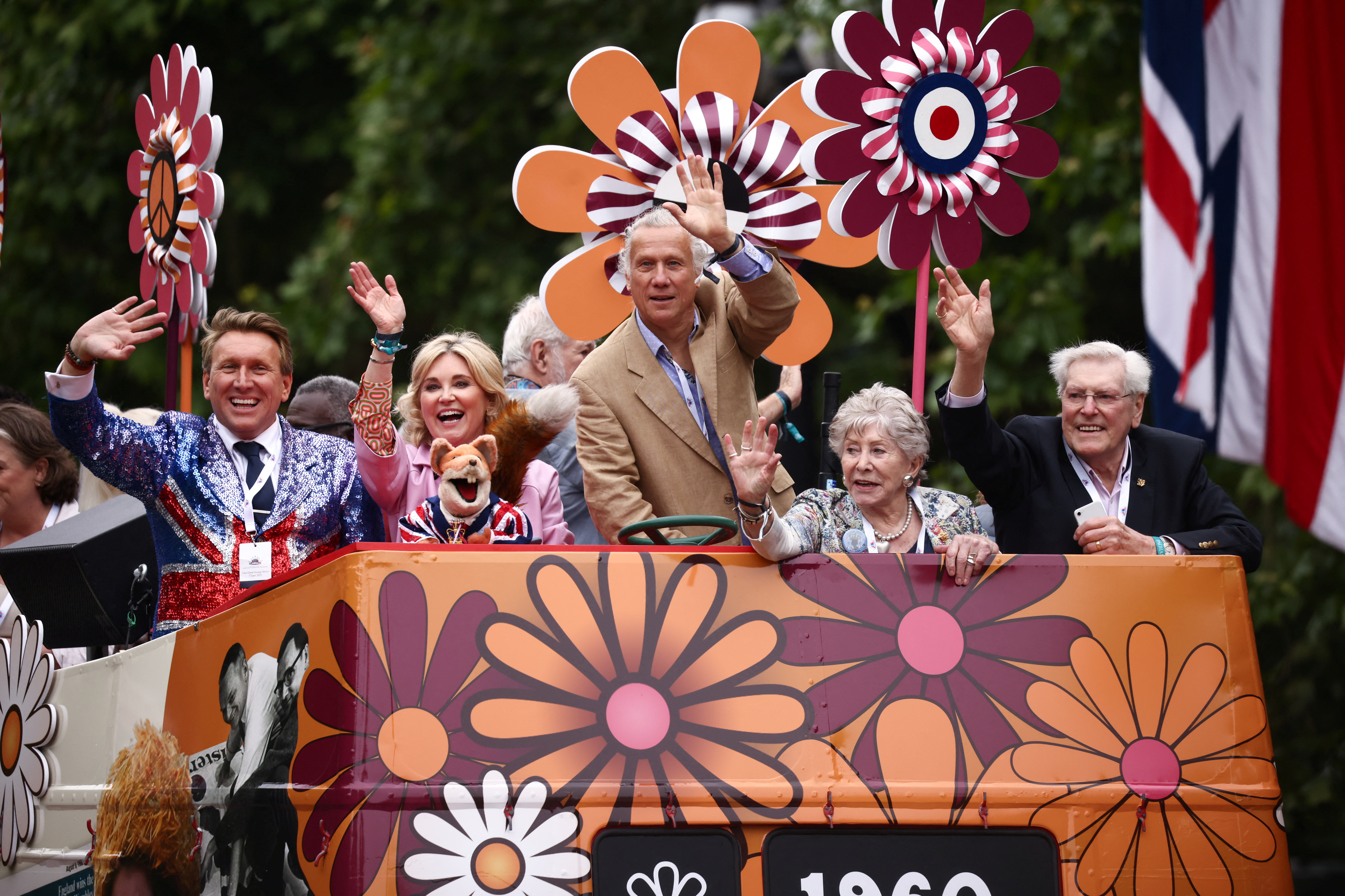 Anthea Turner, Peter Duncan, Peter Purvis and Valerie Singleton participate in a military parade during the Platinum Jubilee competition.  Photograph: Henry Nichols/Reuters