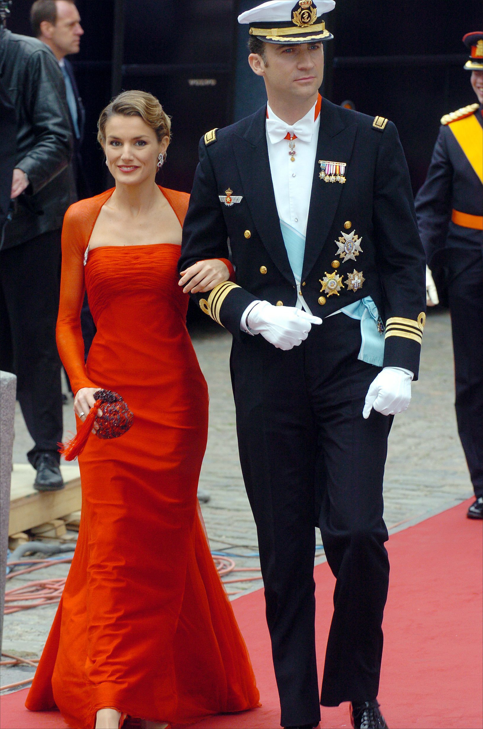 Queen Letizia in a red dress by Roberto Caprile.